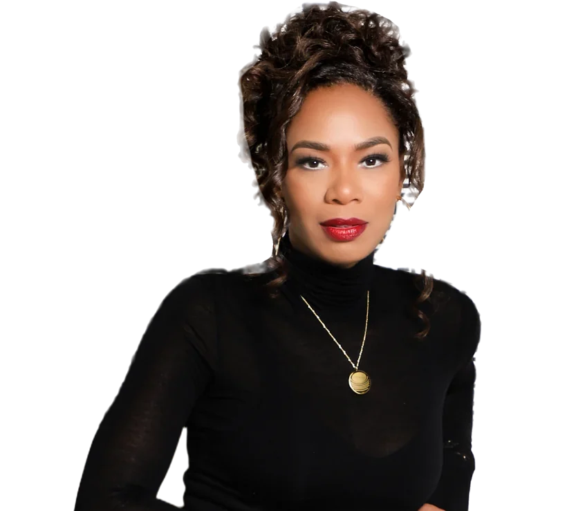 Damali Alexander in a black turtleneck and gold pendant